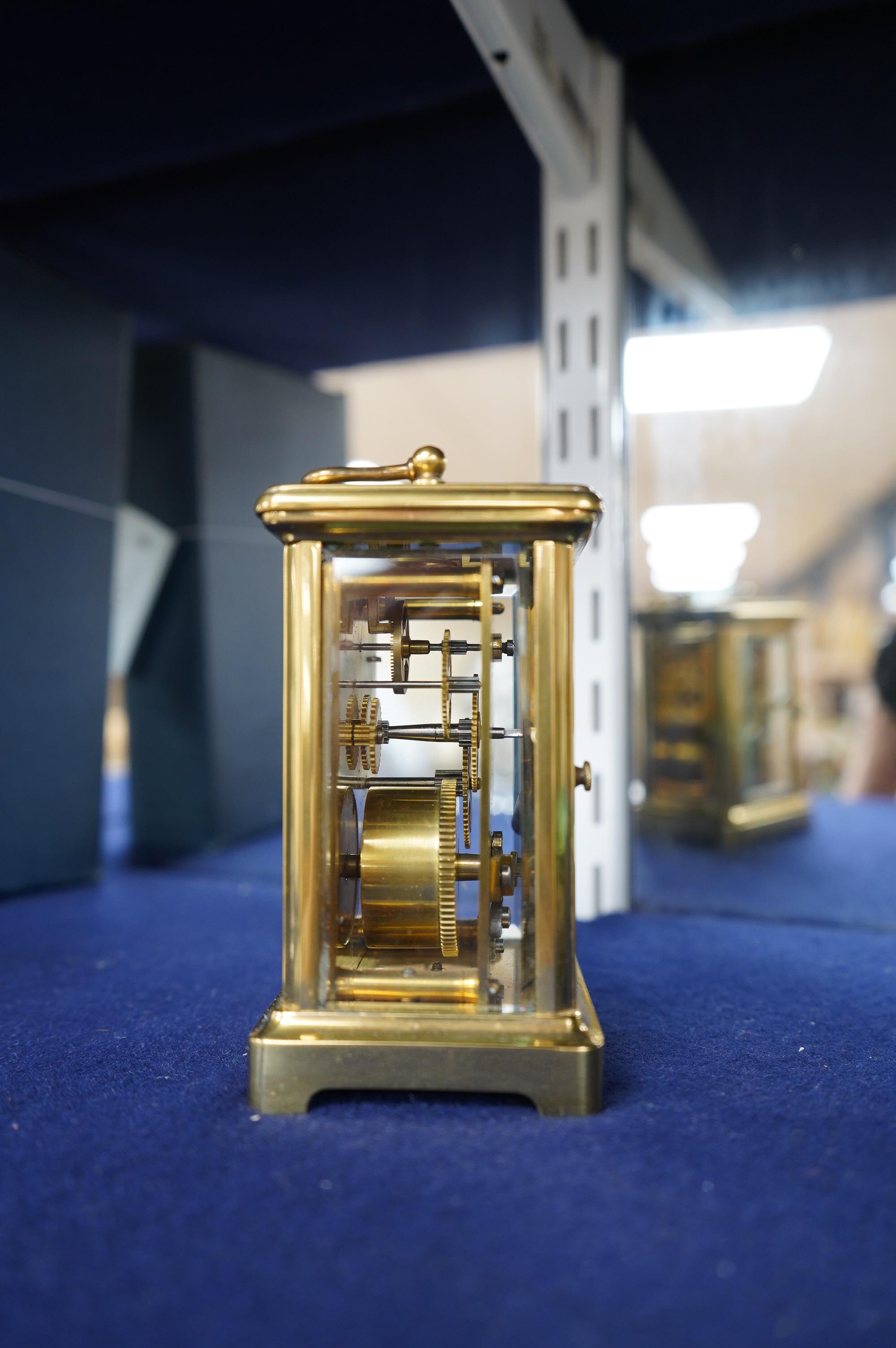 A brass carriage timepiece, 11.5cm high. Condition - good.